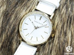 Anne Klein Women's AK/1780WTWT White Dial Gold Detail and White Bracelet